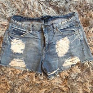 Distressed denim cut off shorts